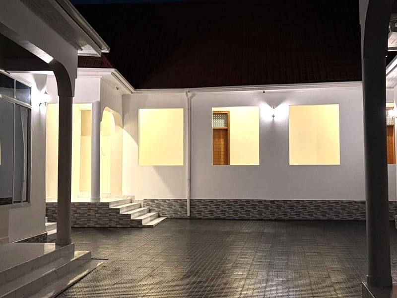 The courtyard and covered walkway after dark